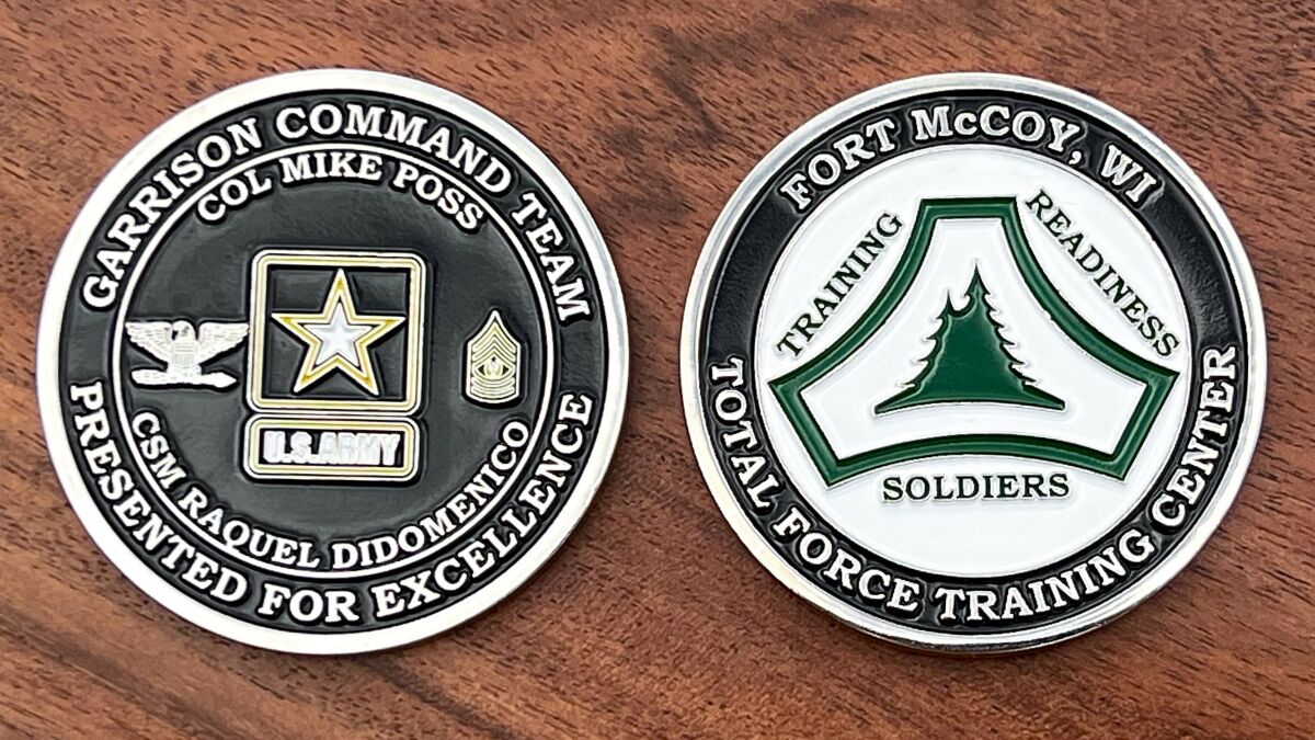 Front and back of polished silver challenge coin ordered for US Amry Total Force Training Center