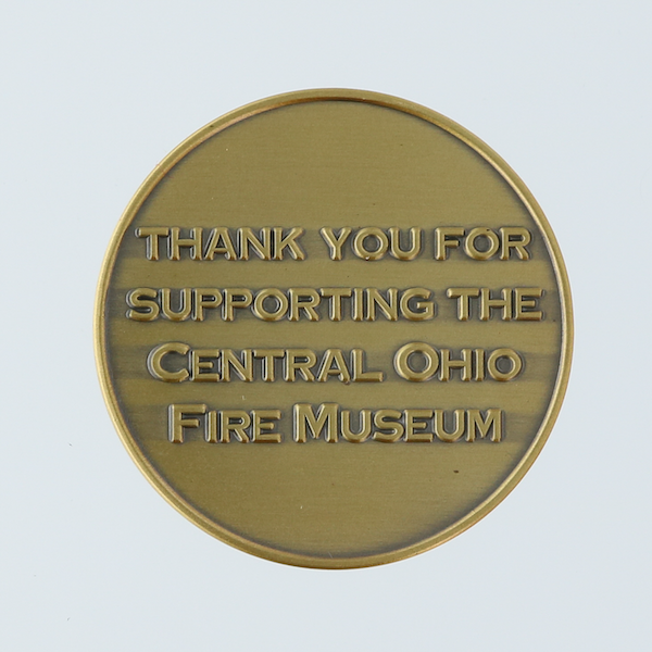 Antique gold coin featuring text: "Thank You for Supporting the Central Ohio Fire Museum"
