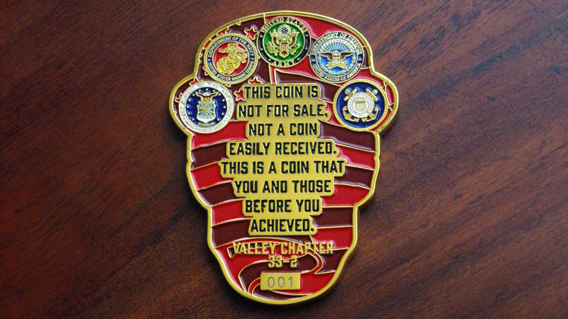 Custom shaped coin representing Valley Chapter 33-2 Combat Veterans Motorcycle Association