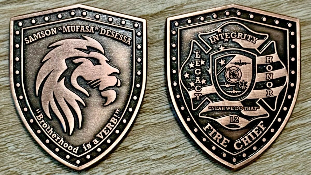 Shield-shaped challenge coin obverse and reverse for Fire Chief Samson DeSassa