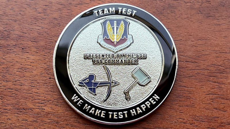 Round custom coin representing the 53rd Test Support Squadron Commander