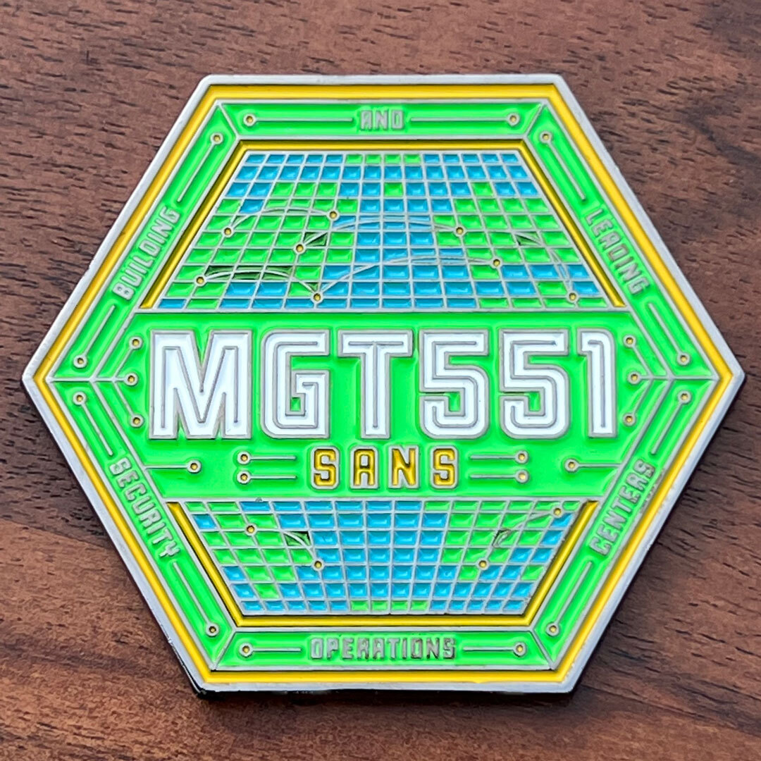 Hexagon-shaped coin with MGT551 in the center, with SANS underneath