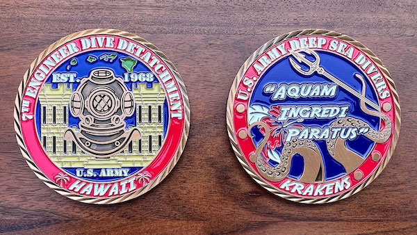 Round challenge coin representing the Army's 7th Engineer Dive Detachment. 