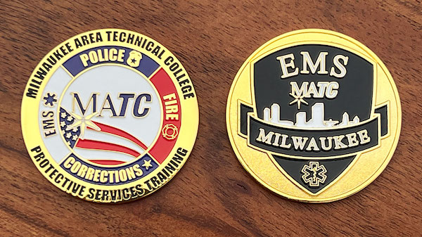 A round gold challenge coin for the Milwaukee Area Technical College Protective Services program. 