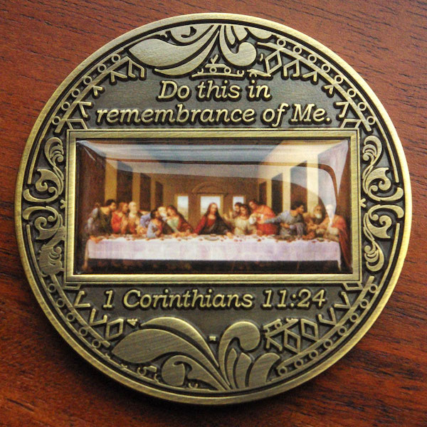 Round challenge coin featuring image of Michaelangelo's “Last Supper.” 