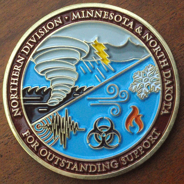 A round challenge coin for the Northern Division of the Salvation Army. 