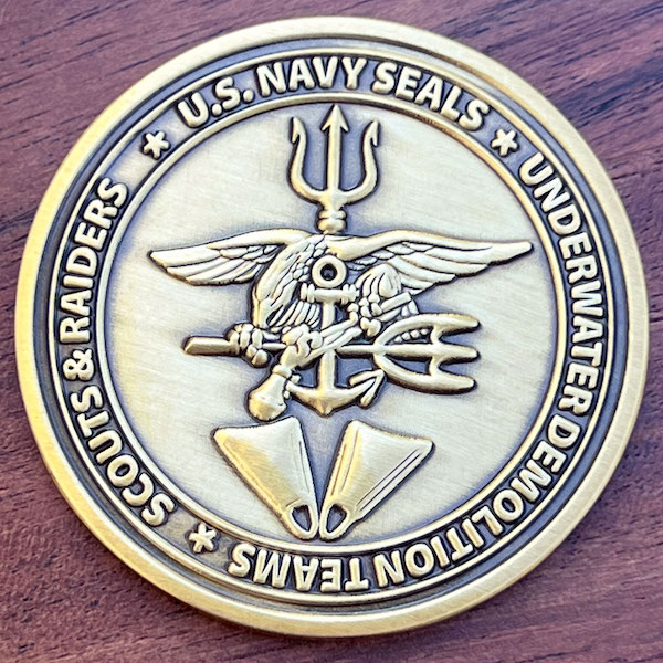 Round U.S. Navy Seals military challenge coin. 