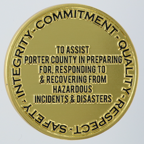 Reverse of challenge coin ordered by Porter County Indiana Emergency Management Agency. Gold with black text.