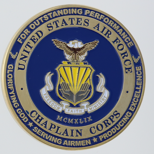 Front side of a challenge coin belonging to the Air Force Chaplain Corps. 