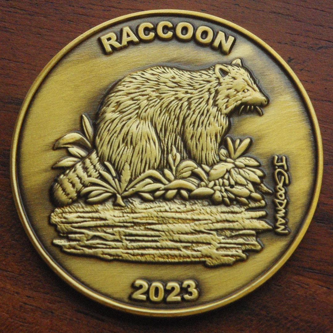Reverse side of round gold coin representing Pennsylvania Trappers Association