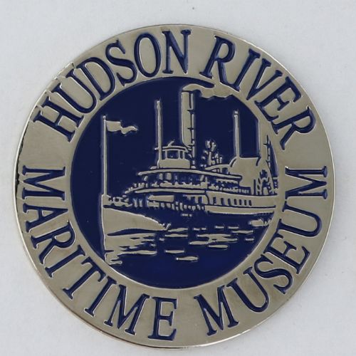 Front side of a silver challenge coin commemorating the Hudson River Maritime Museum in Kingston, New York. 